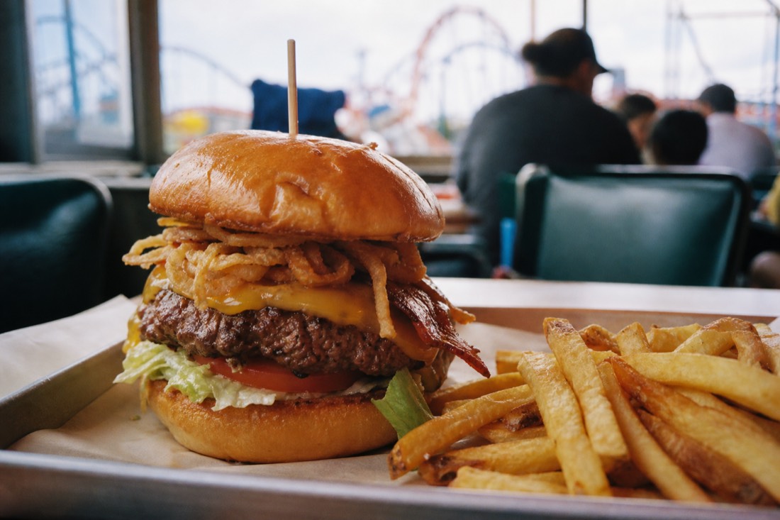 A big themed burger and fries at a Fuji-Q Highland diner
